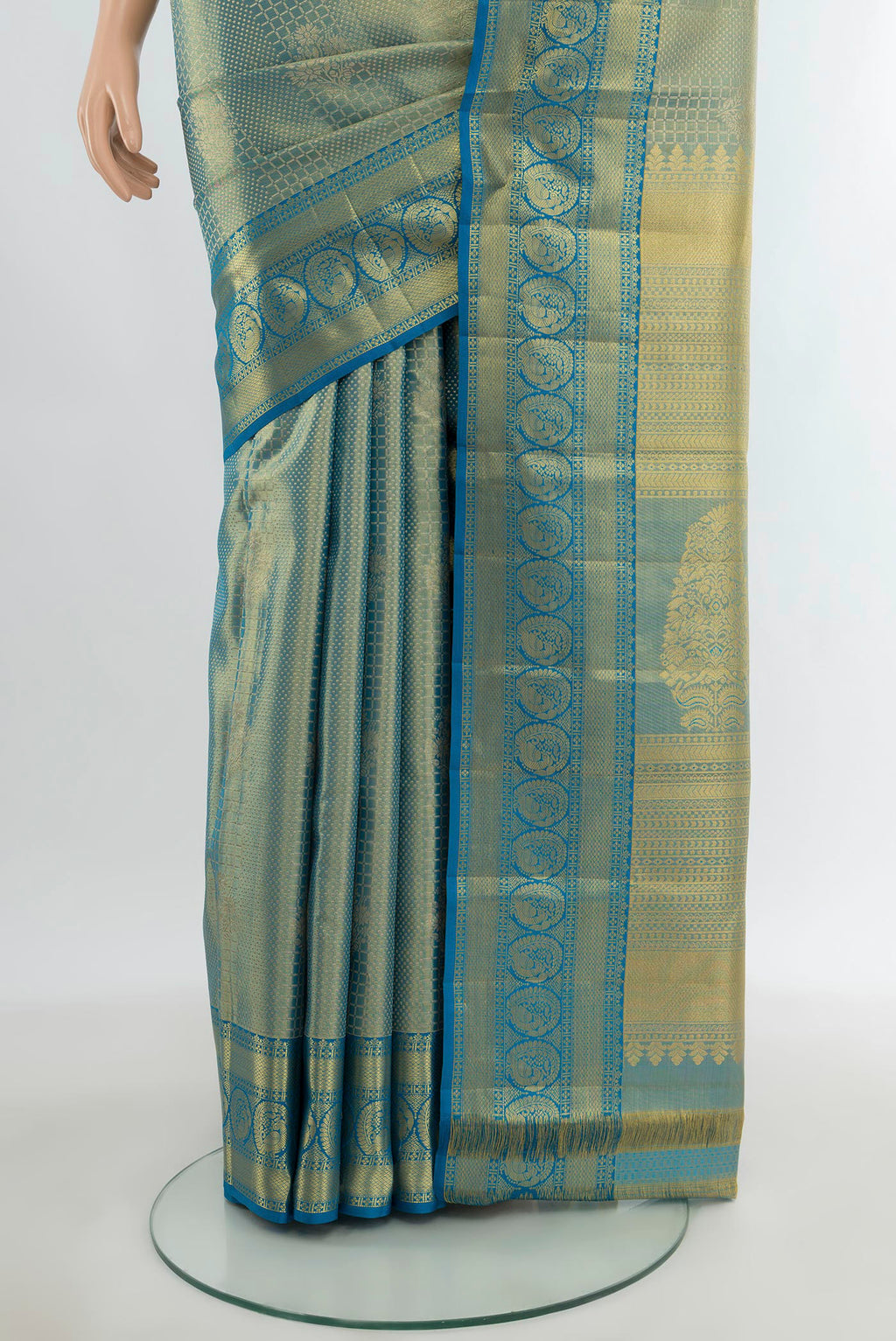 Pleats and pallu of Light Blue Kanchipuram Silk Saree with Zari Brocade on the body and Zari Border. 