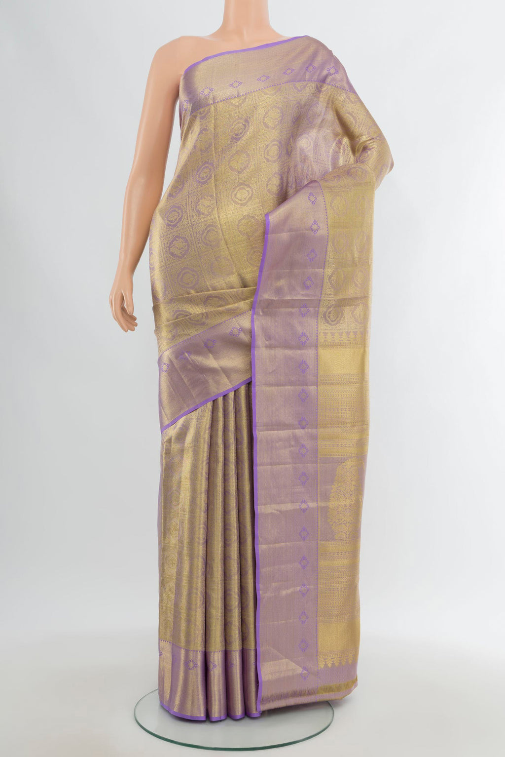 Lavender Kanchipuram Tissue Silk Saree with Zari Brocade on the body and Zari Border.  displayed on a mannequin