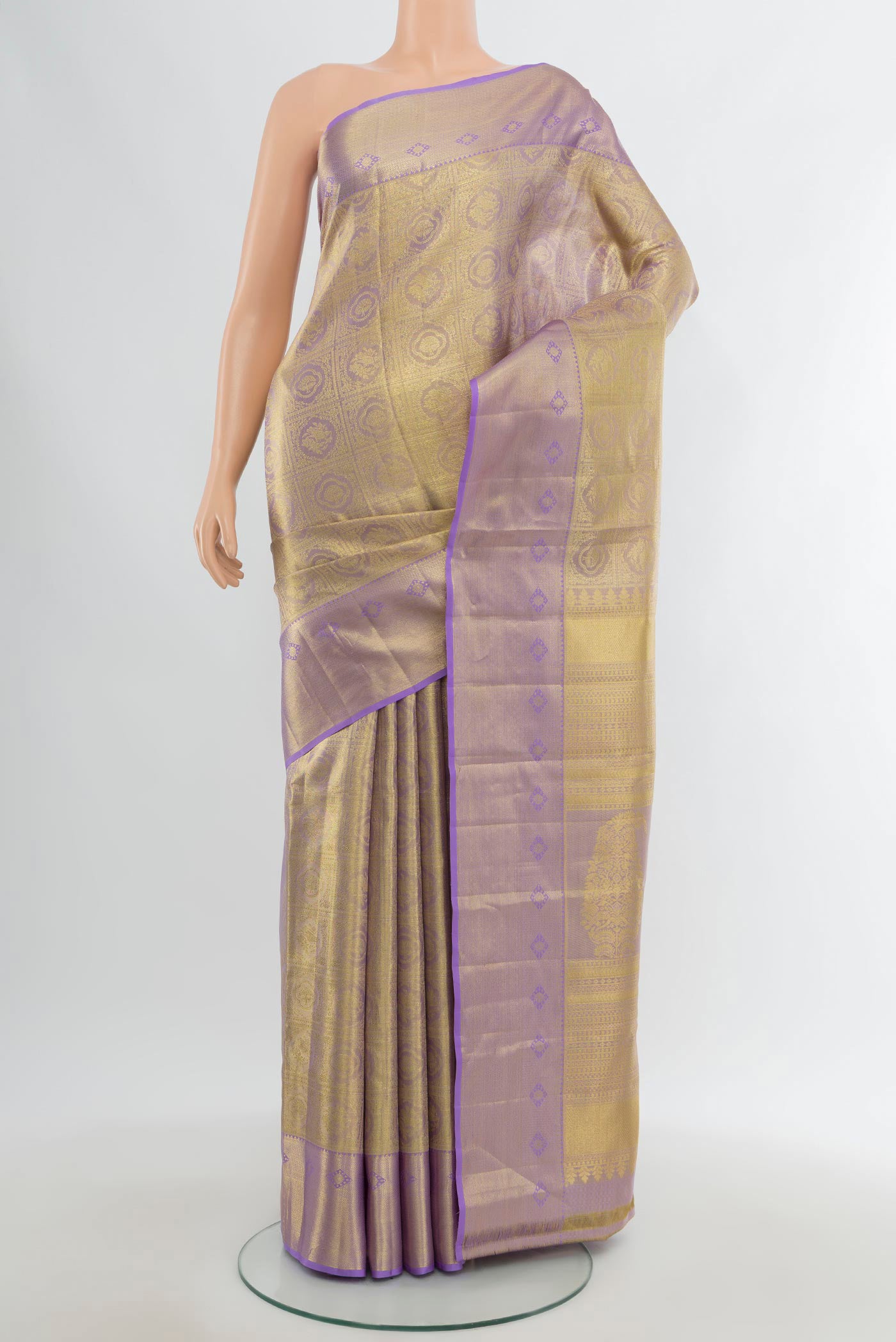 Lavender Kanchipuram Tissue Silk Saree with Zari Brocade on the body and Zari Border.  displayed on a mannequin
