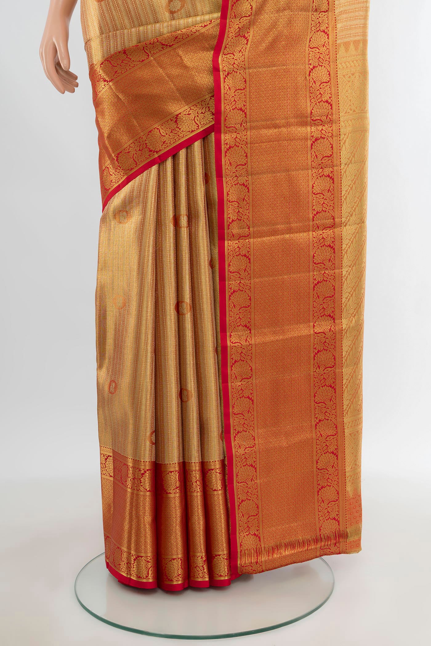 Pleats and pallu of Golden Kanchipuram Tissue Silk Saree with Zari Brocade on the body and Zari Border. 