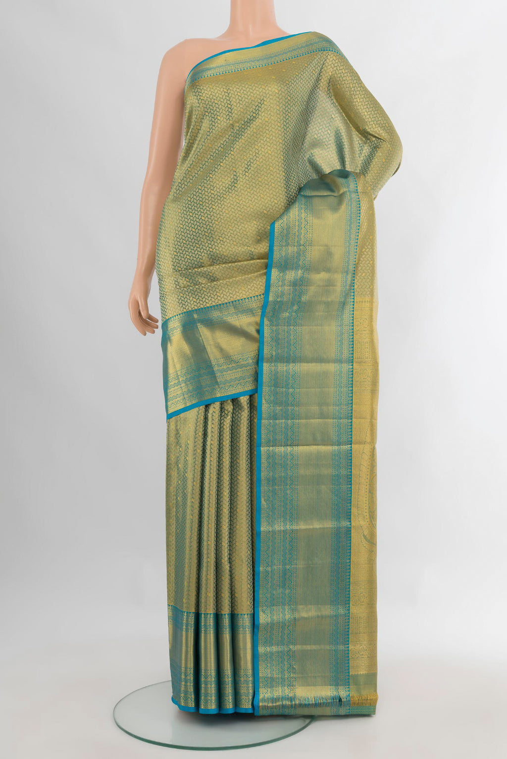 Pure Silk Multi Color Kanchipuram Saree with Zari Brocade on the body and Zari Border.  displayed on a mannequin