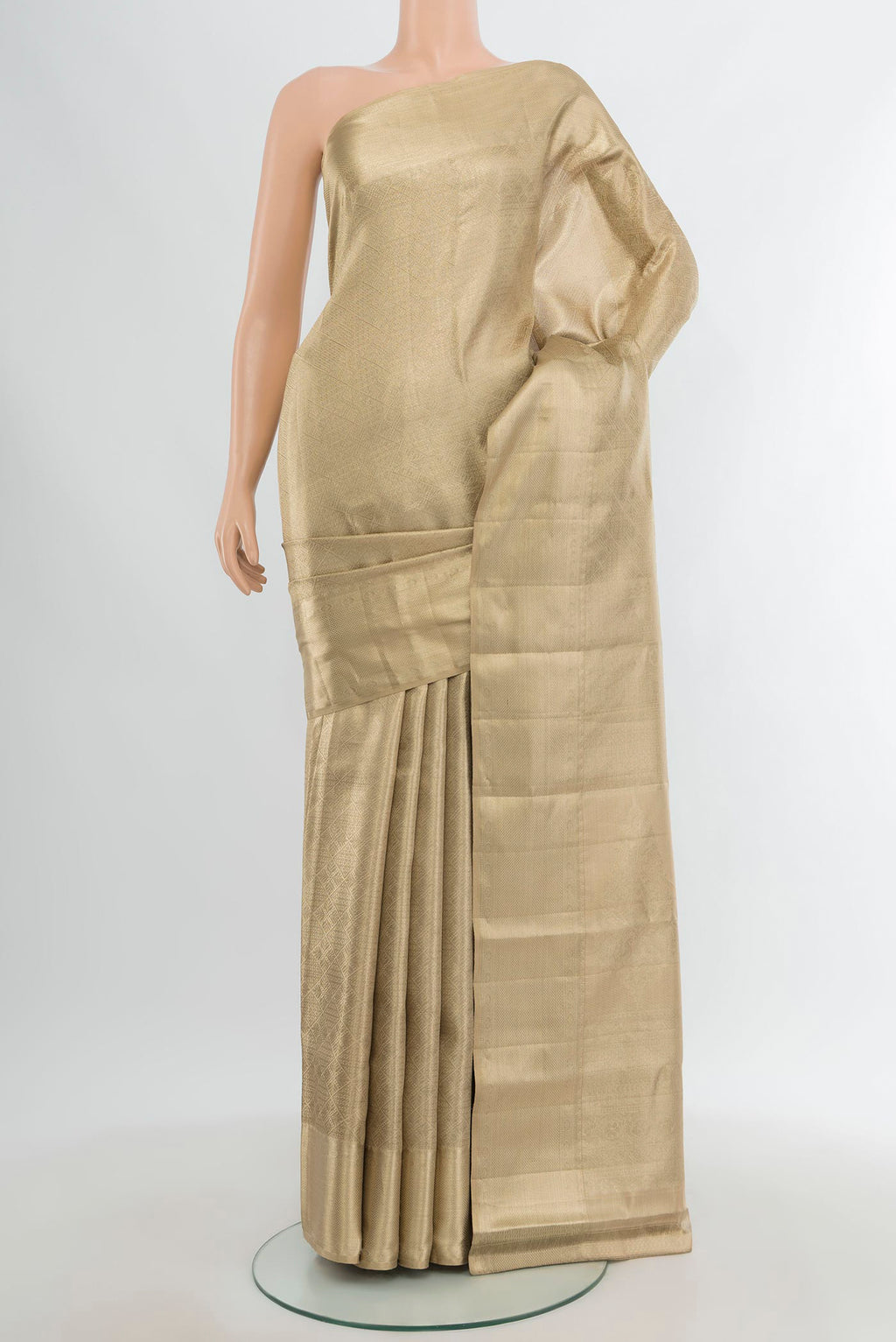 Beige Kanjivaram Tissue Silk Saree with Zari Brocade on the body and Zari Border.  displayed on a mannequin