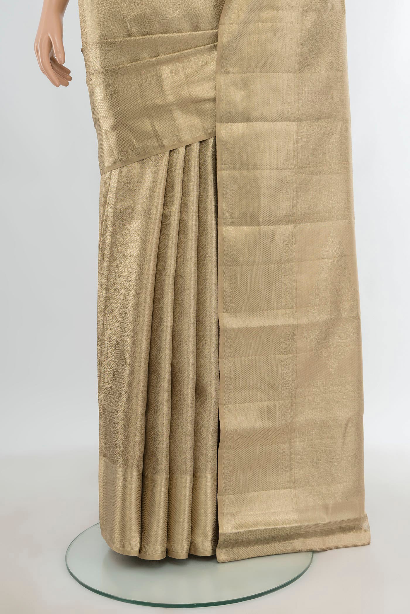 Pleats and pallu of Beige Kanjivaram Tissue Silk Saree with Zari Brocade on the body and Zari Border. 
