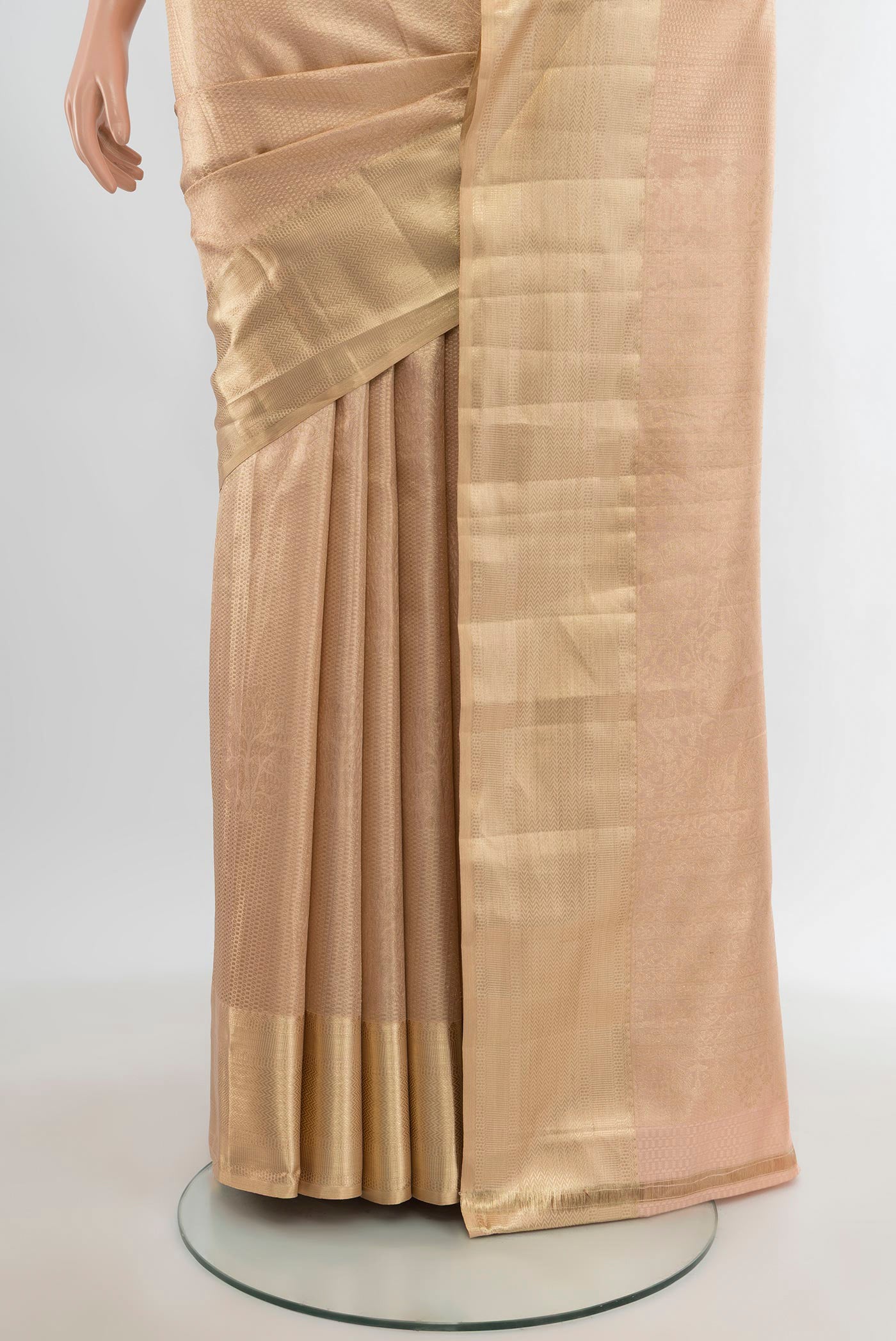Pleats and pallu of Rose Gold Kanjivaram Silk Saree with Zari Brocade on the body and Zari Border. 