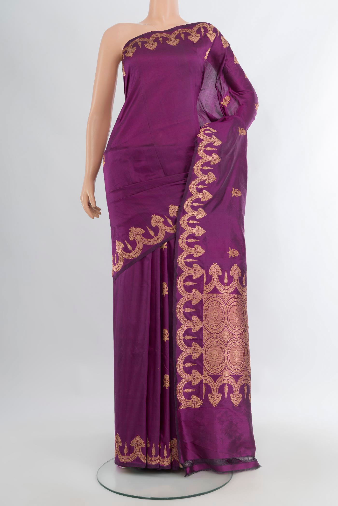 Purple Banarasi Katan Silk Saree with Zari Butta on the body and Fancy Border.  displayed on a mannequin