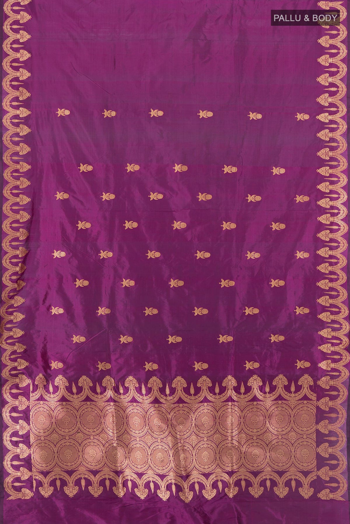 Flat view of Purple Banarasi Katan Silk Saree with Zari Butta on the body and Fancy Border. 