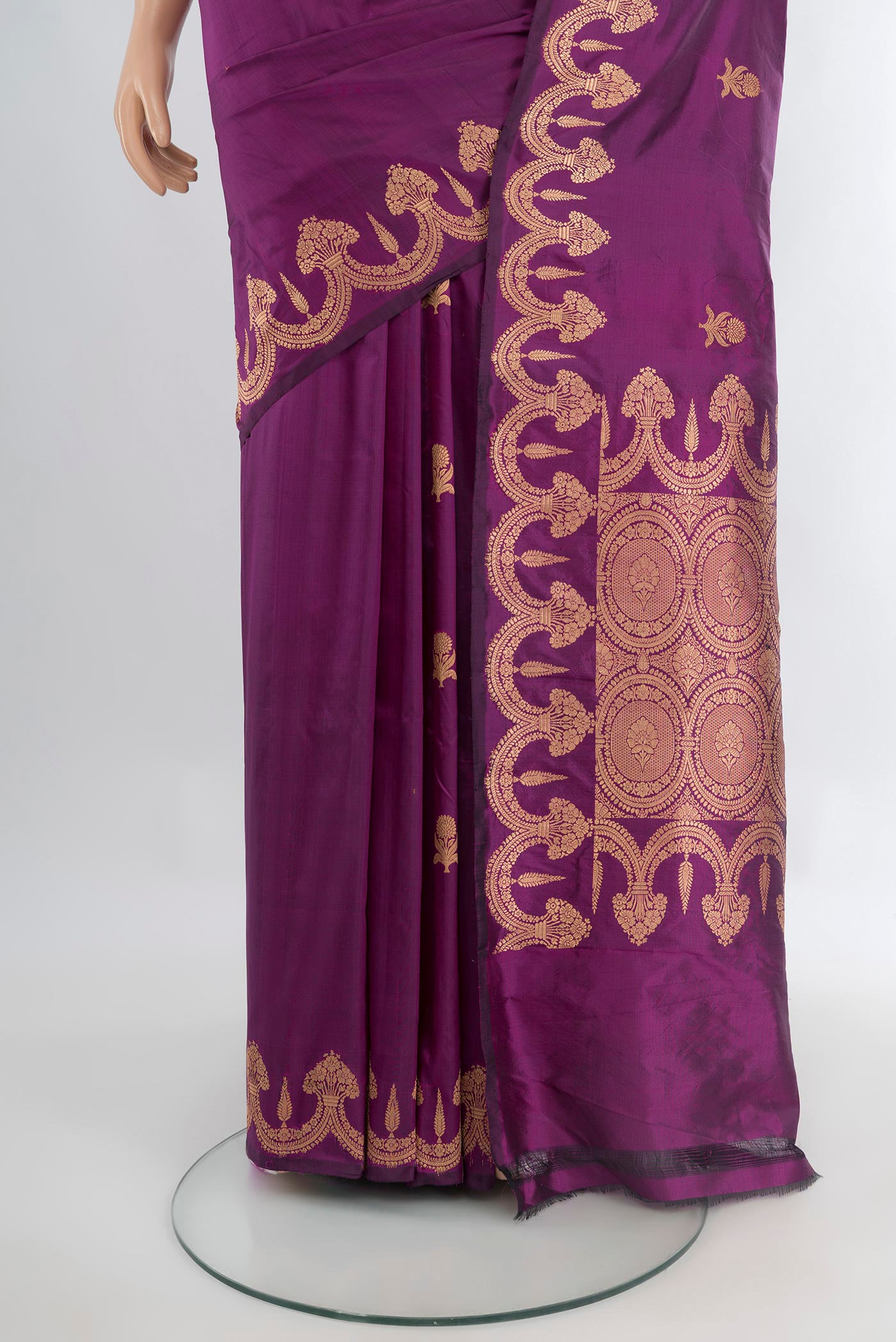 Pleats and pallu of Purple Banarasi Katan Silk Saree with Zari Butta on the body and Fancy Border. 