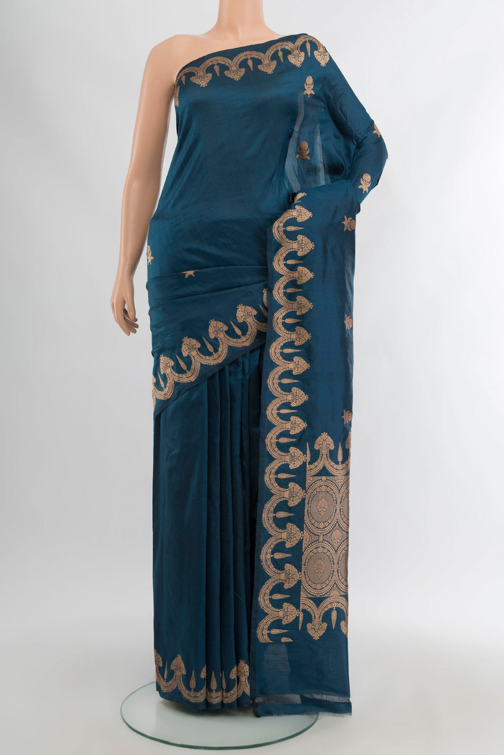 Blue Banarasi Katan Silk Saree with Zari Butta on the body and Fancy Border.  displayed on a mannequin