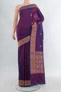 Purple Banarasi Katan Silk Saree with Zari Butta on the body and Zari Border.  displayed on a mannequin