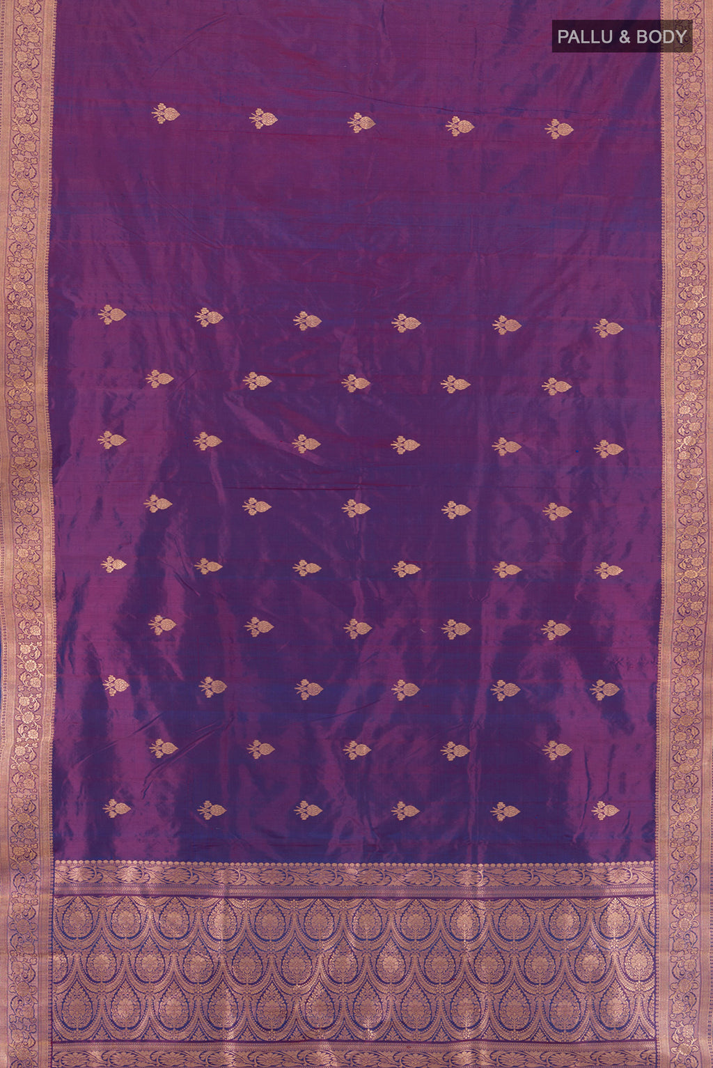 Flat view of Purple Banarasi Katan Silk Saree with Zari Butta on the body and Zari Border. 