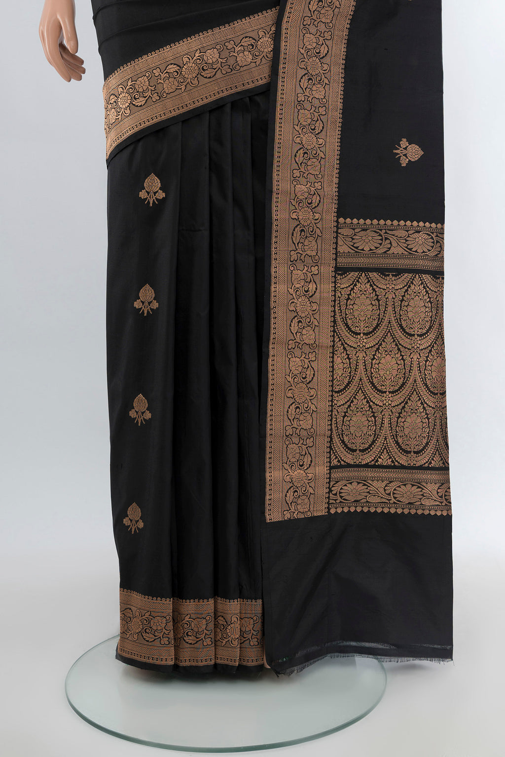 Pleats and pallu of Black Banarasi Katan Silk Saree with Zari Butta on the body and Zari Border. 