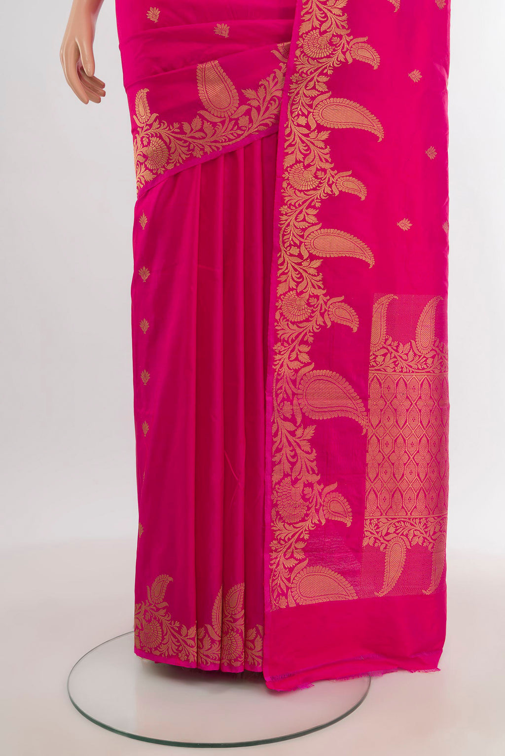 Pleats and pallu of Rani Pink Banarasi Katan Silk Saree with Zari Butta on the body and Fancy Border. 