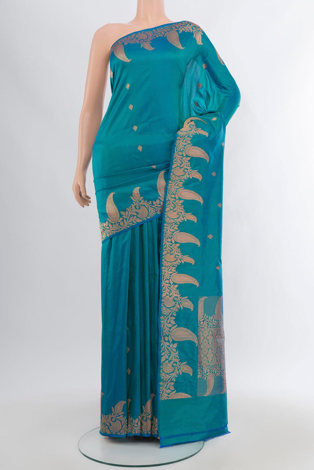 Blue Banarasi Katan Silk Saree with Zari Butta on the body and Fancy Border.  displayed on a mannequin
