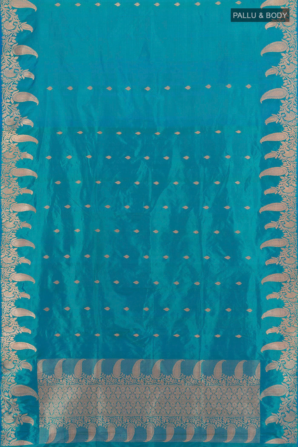 Flat view of Blue Banarasi Katan Silk Saree with Zari Butta on the body and Fancy Border. 