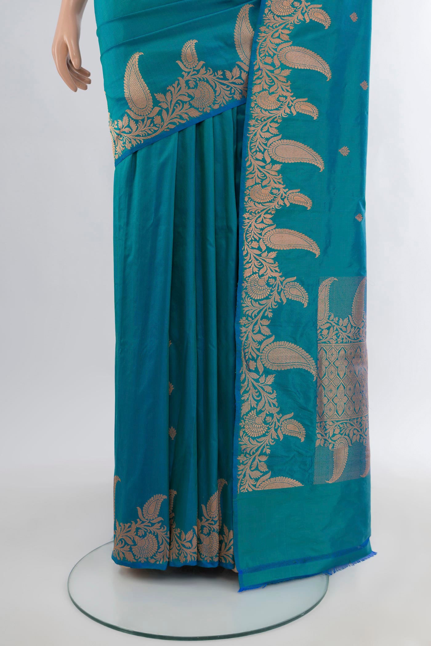 Pleats and pallu of Blue Banarasi Katan Silk Saree with Zari Butta on the body and Fancy Border. 
