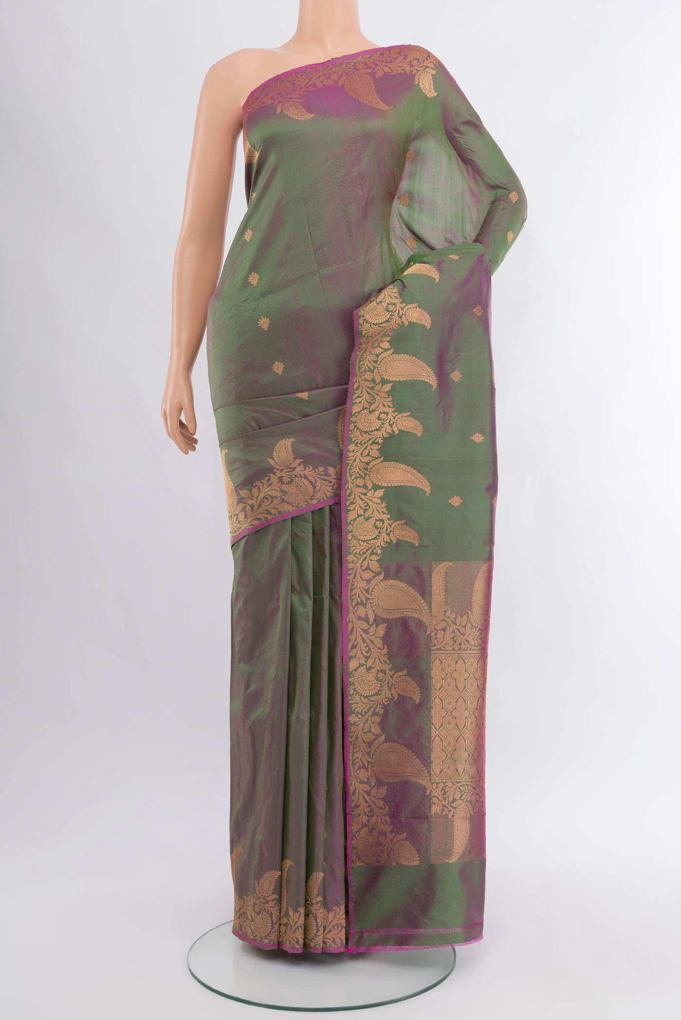 Green with Purple Color Banarasi Katan Silk Saree with Zari Butta on the body and Fancy Border.  displayed on a mannequin