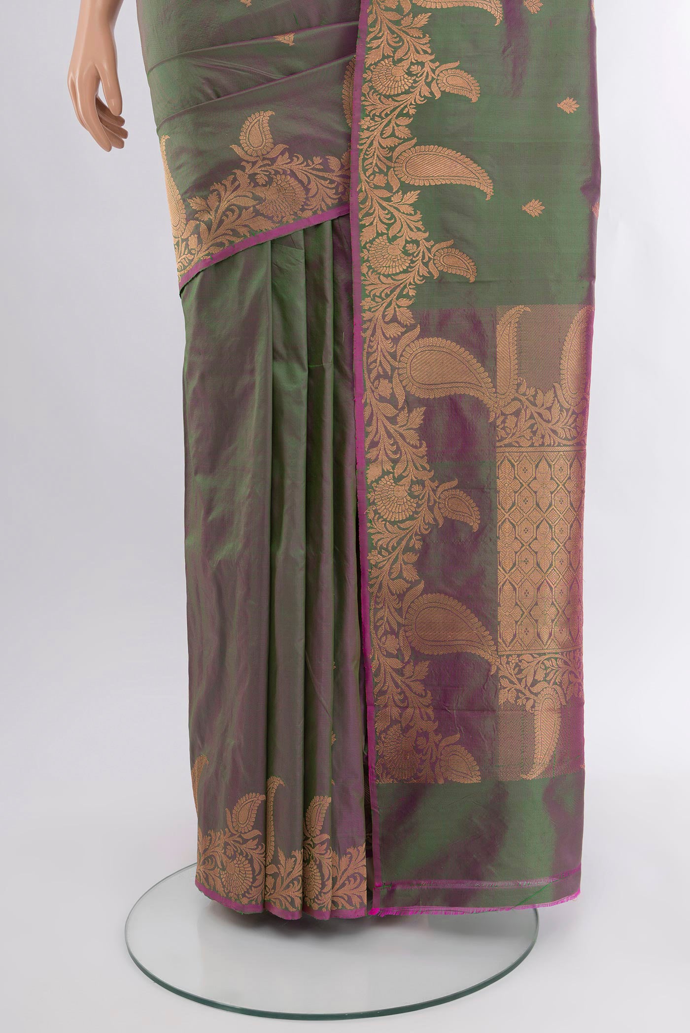 Pleats and pallu of Green with Purple Color Banarasi Katan Silk Saree with Zari Butta on the body and Fancy Border. 