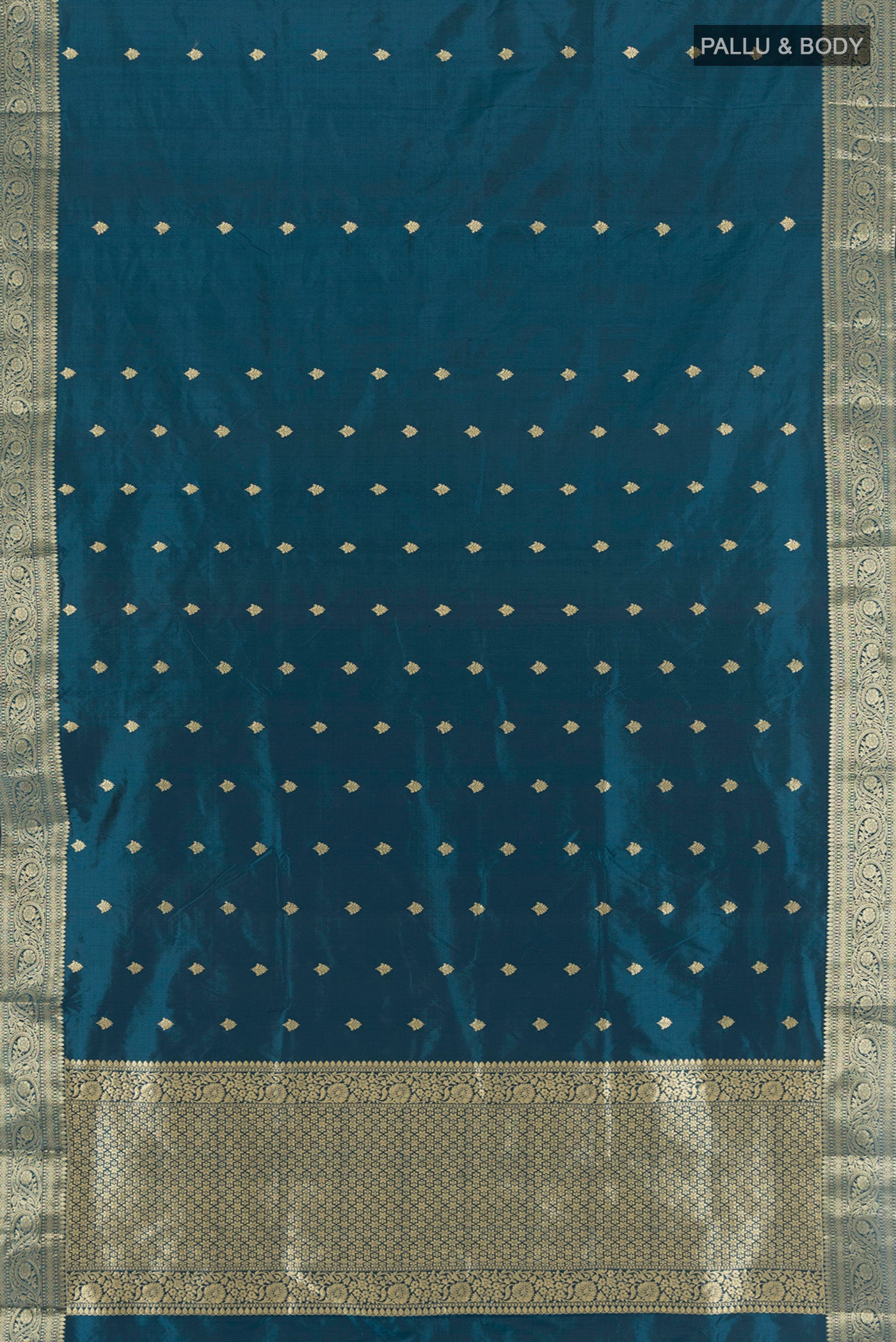 Flat view of Blue Banarasi Katan Silk Saree with Zari Butta on the body and Zari Border. 