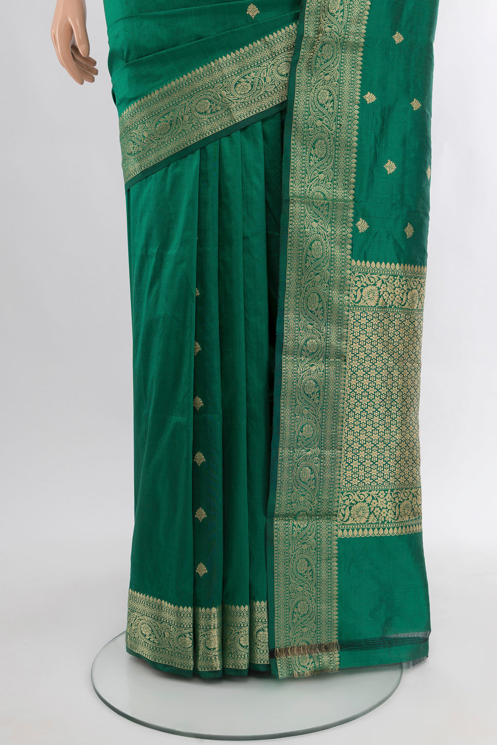 Pleats and pallu of Green Banarasi Katan Silk Saree with Zari Butta on the body and Zari Border. 