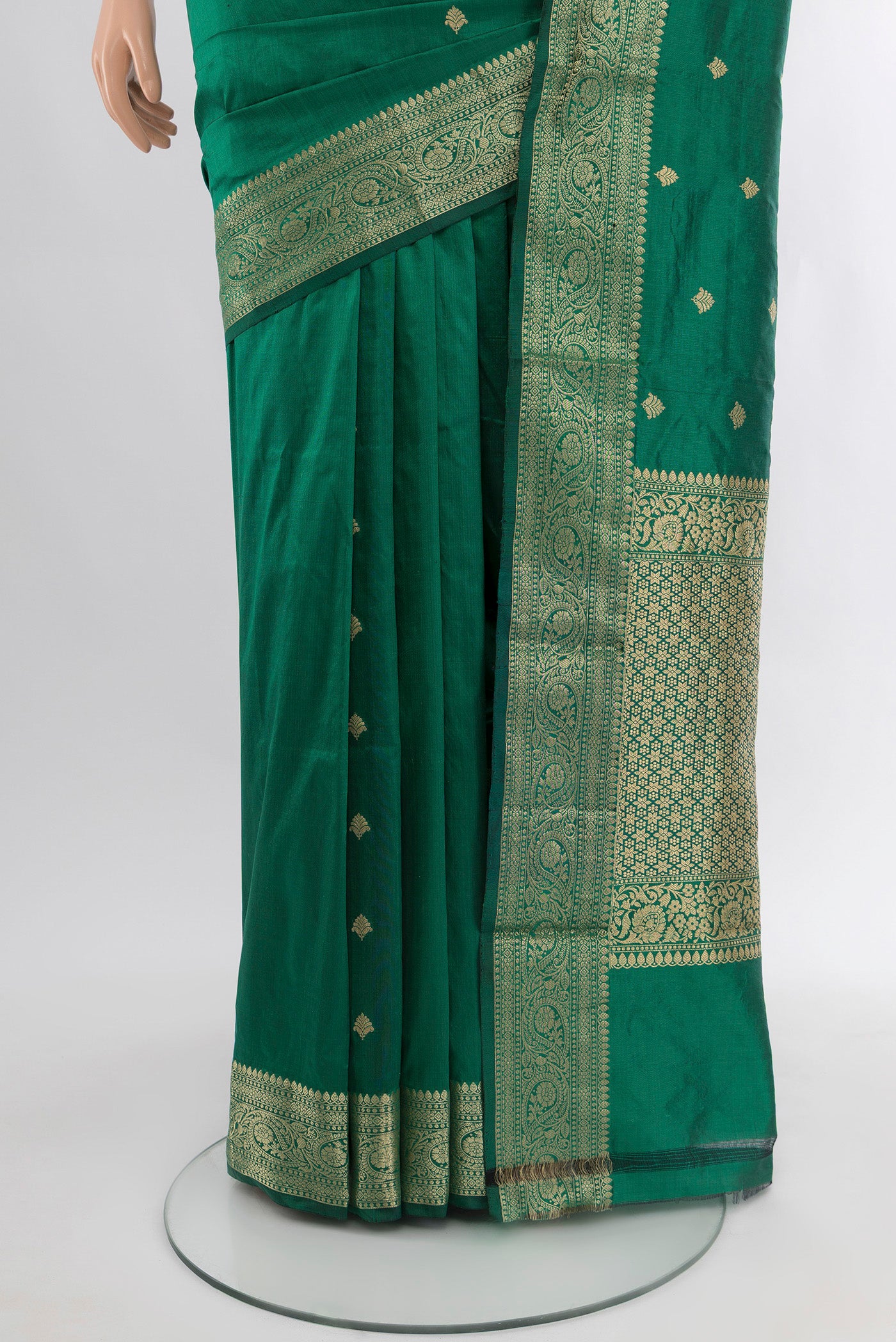 Pleats and pallu of Green Banarasi Katan Silk Saree with Zari Butta on the body and Zari Border. 