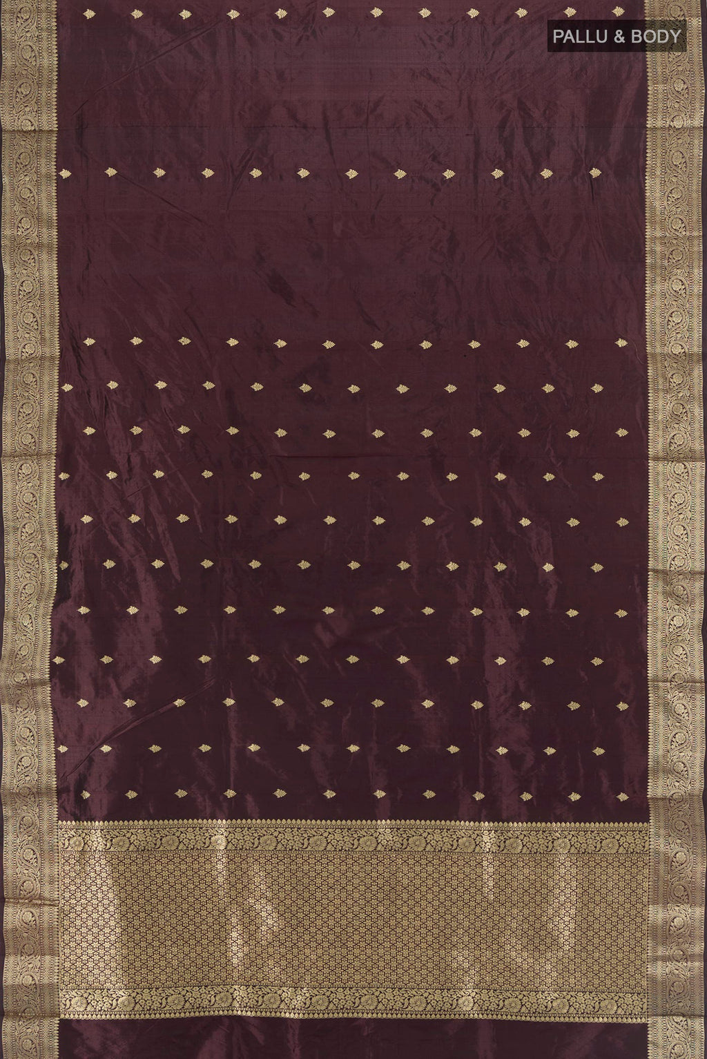 Flat view of Coffee Brown Banarasi Katan Silk Saree with Zari Butta on the body and Zari Border. 
