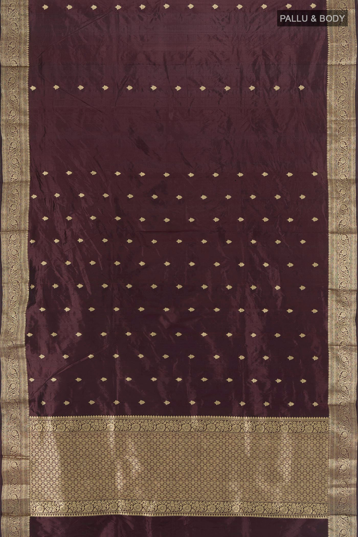 Flat view of Coffee Brown Banarasi Katan Silk Saree with Zari Butta on the body and Zari Border. 