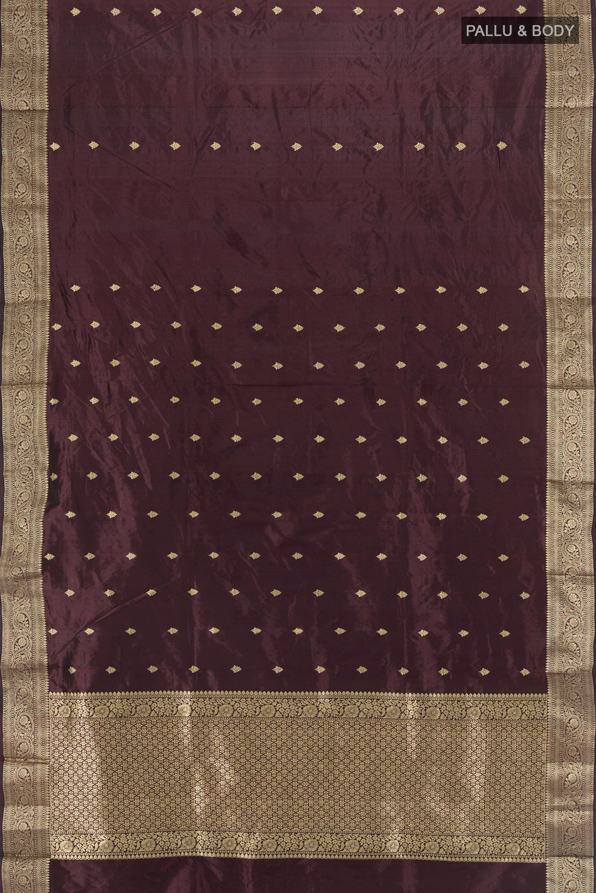 Flat view of Coffee Brown Banarasi Katan Silk Saree with Zari Butta on the body and Zari Border. 