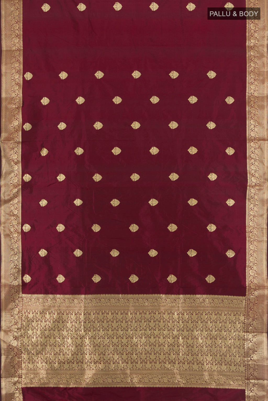 Flat view of Maroon Banarasi Katan Silk Saree with Zari Butta on the body and Zari Border. 