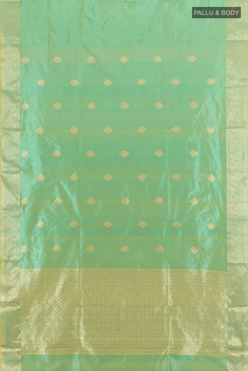 Flat view of Pure Silk Light Green Banarasi Katan Saree with Zari Butta on the body and Zari Border. 