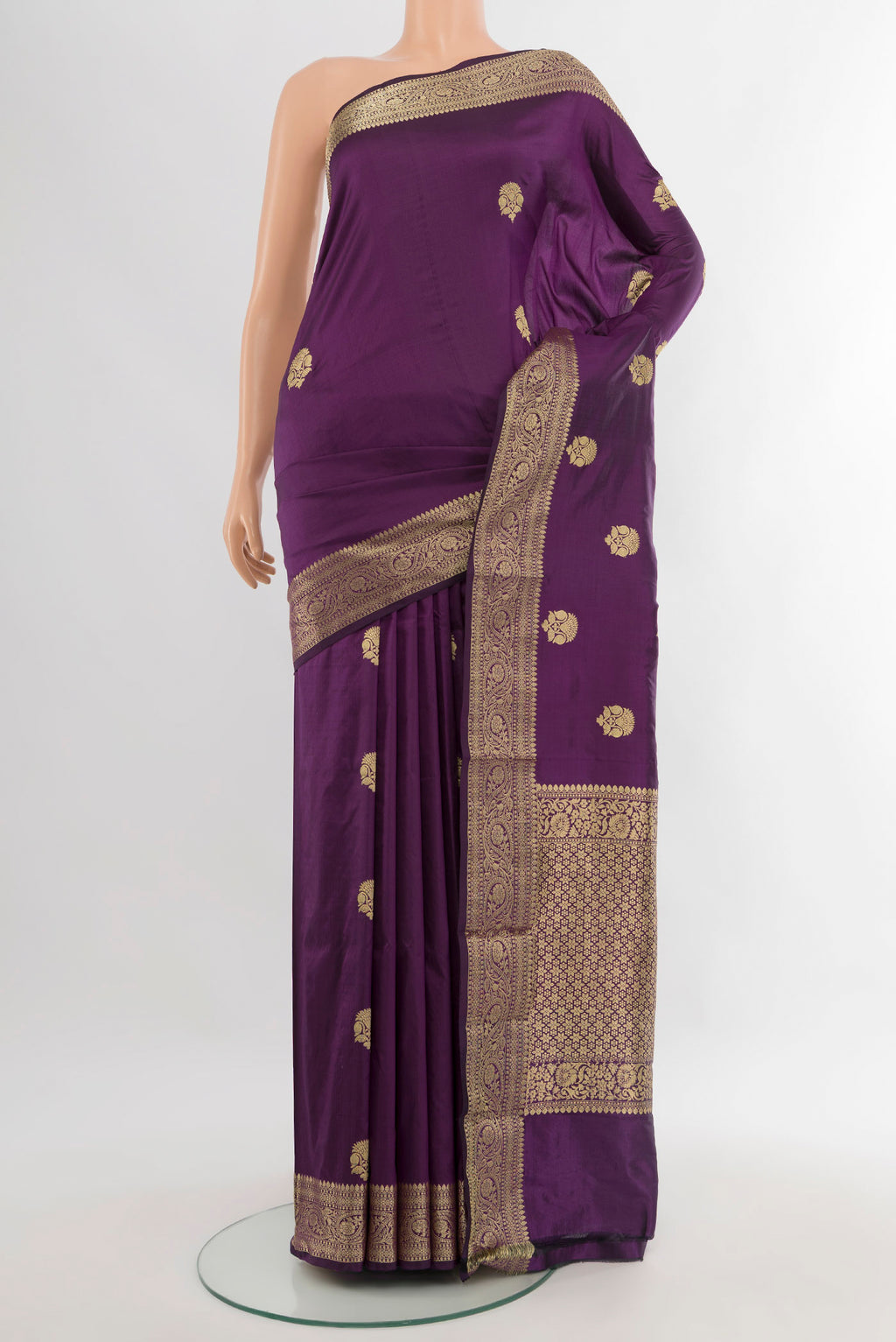Violet Banarasi Katan Silk Saree with Zari Butta on the body and Zari Border.  displayed on a mannequin