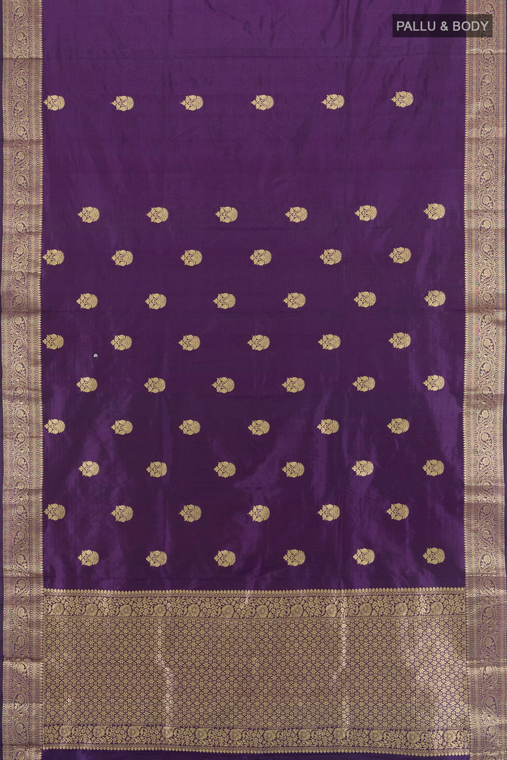 Flat view of Violet Banarasi Katan Silk Saree with Zari Butta on the body and Zari Border. 