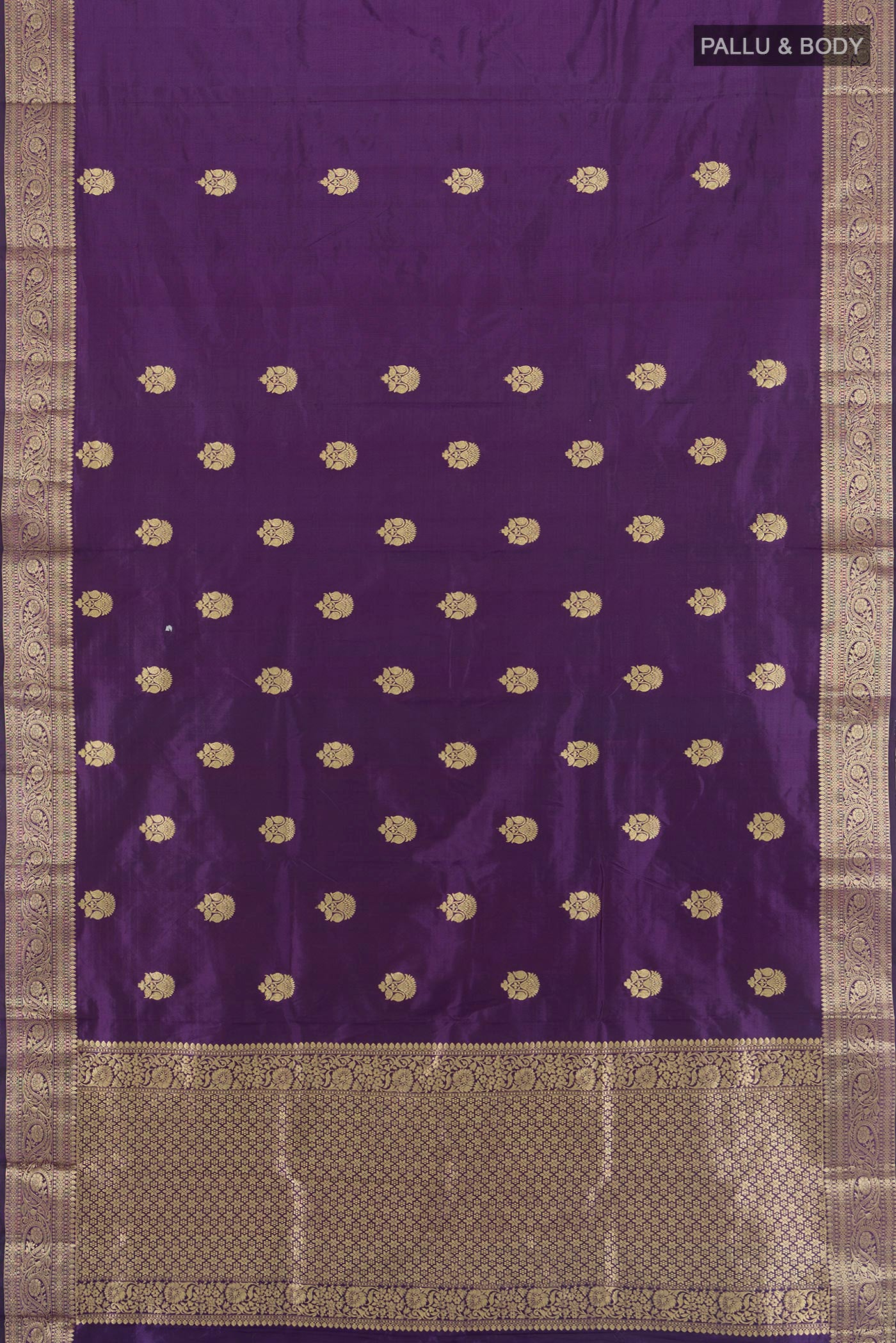 Flat view of Violet Banarasi Katan Silk Saree with Zari Butta on the body and Zari Border. 