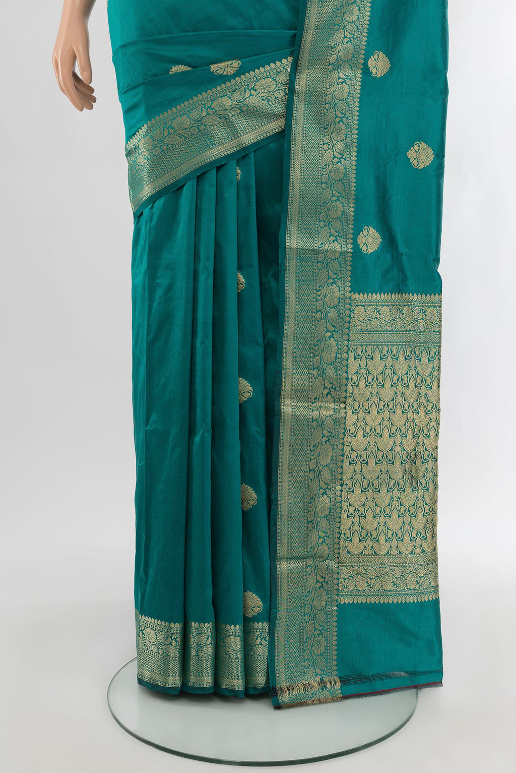 Pleats and pallu of Teal Banarasi Katan Silk Saree with Zari Butta on the body and Zari Border. 