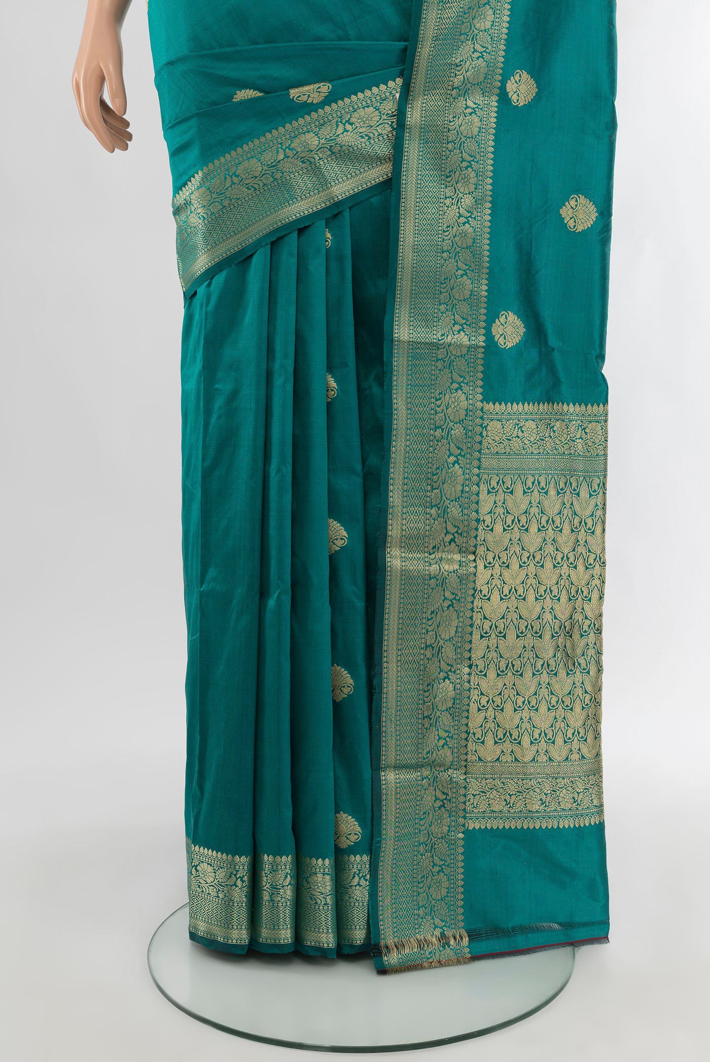 Pleats and pallu of Teal Banarasi Katan Silk Saree with Zari Butta on the body and Zari Border. 