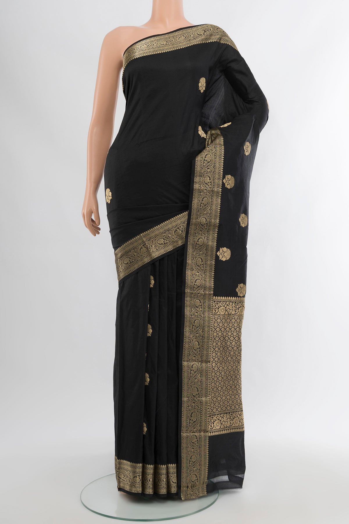 Black Banarasi Katan Silk Saree with Zari Butta on the body and Zari Border.  displayed on a mannequin