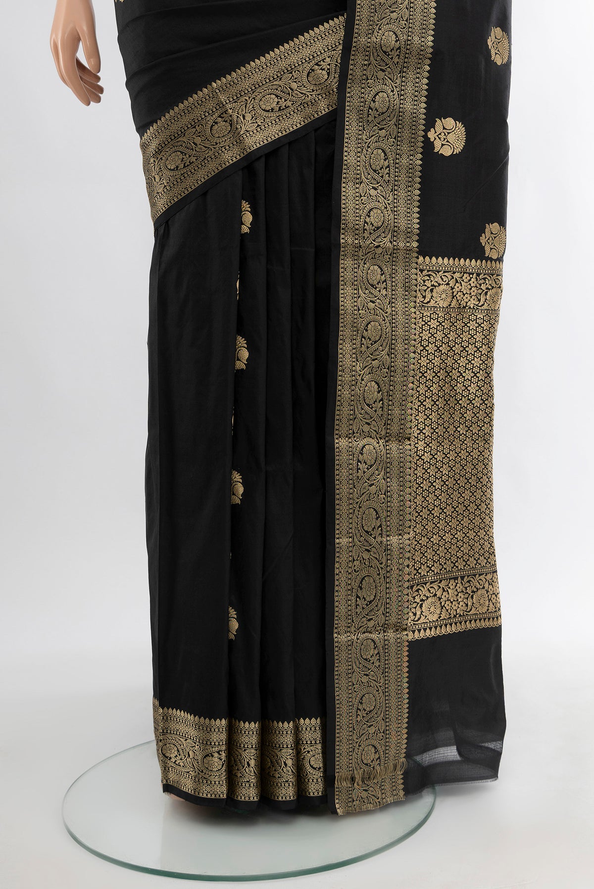 Pleats and pallu of Black Banarasi Katan Silk Saree with Zari Butta on the body and Zari Border. 