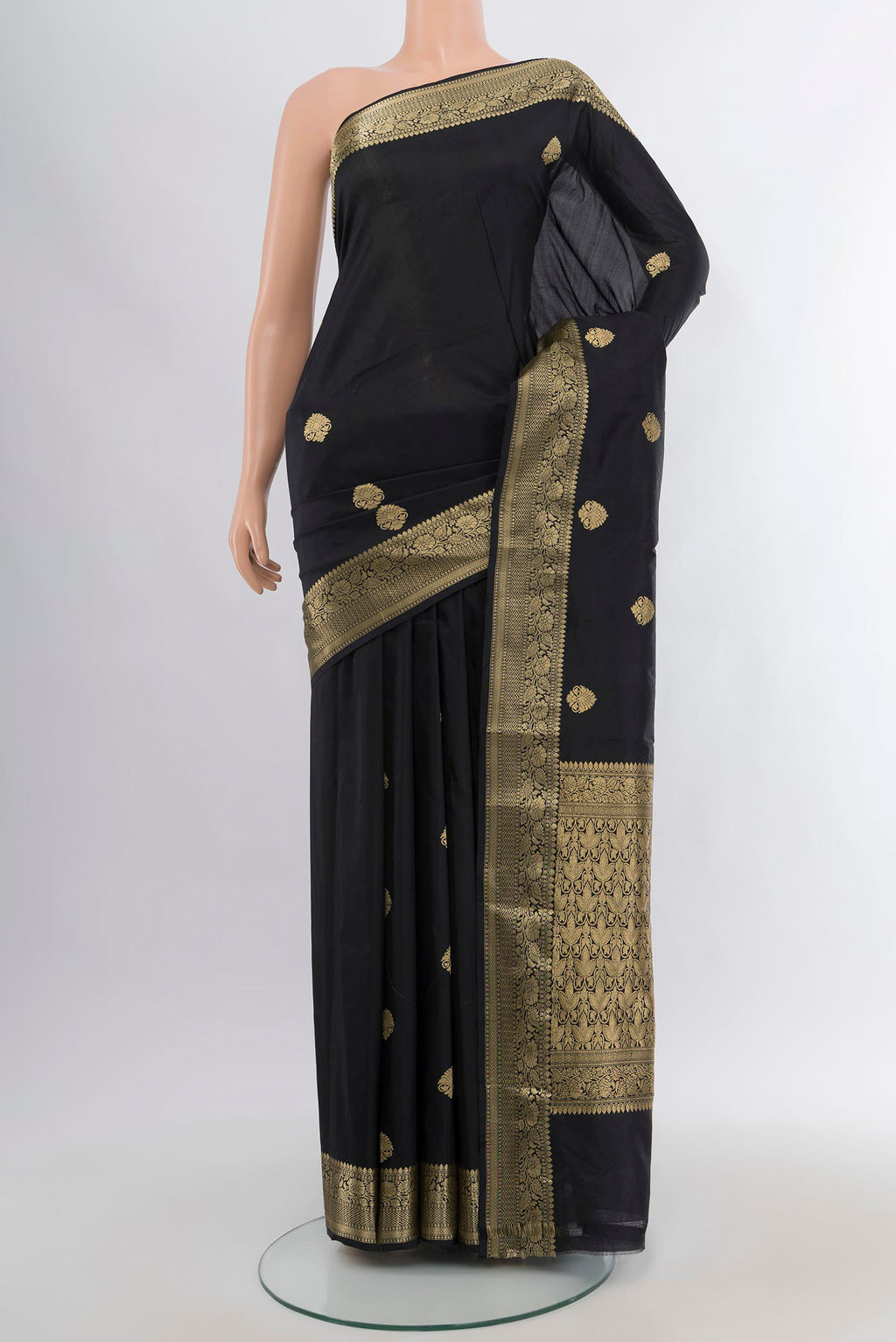 Black Banarasi Katan Silk Saree with Zari Butta on the body and Zari Border.  displayed on a mannequin