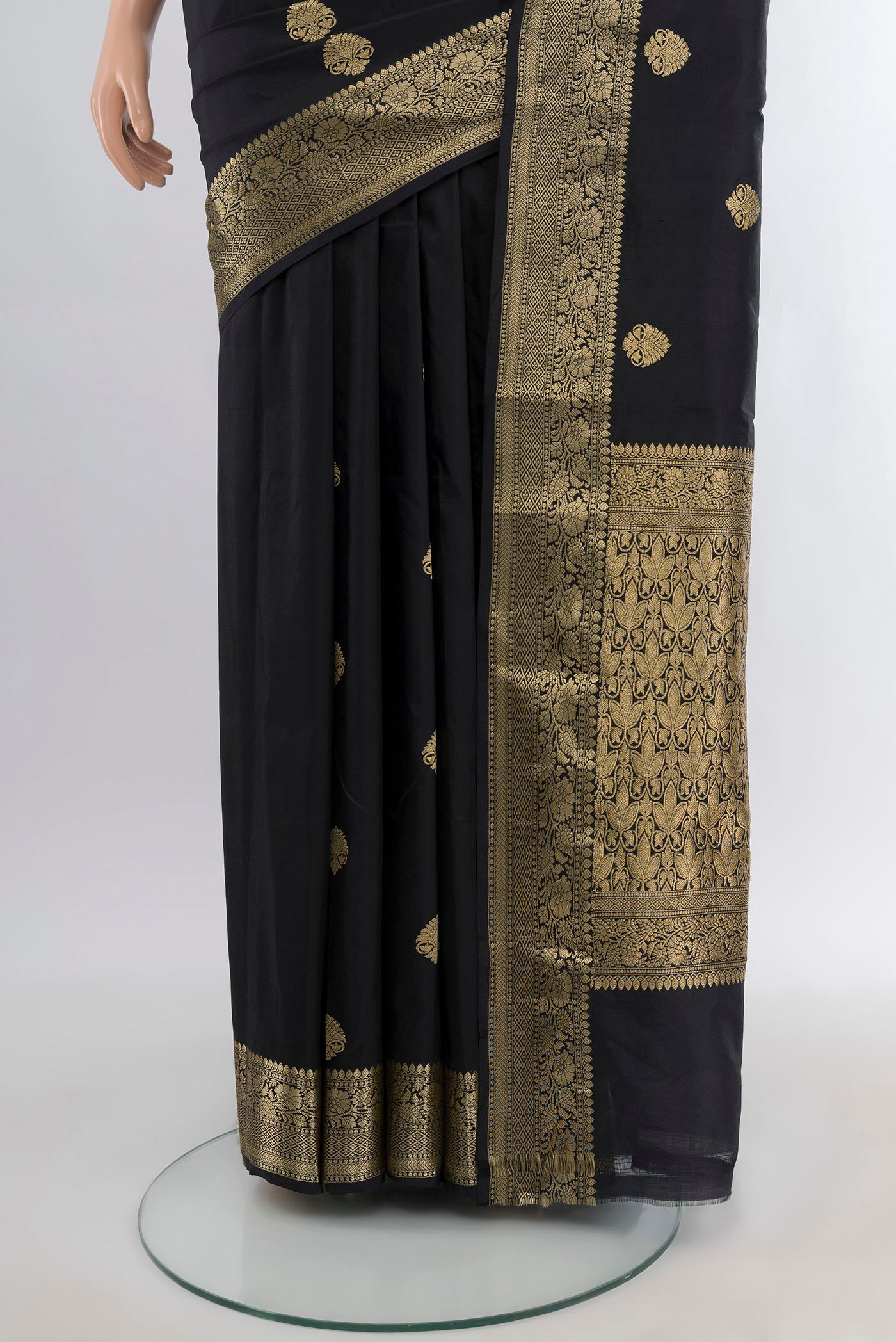 Pleats and pallu of Black Banarasi Katan Silk Saree with Zari Butta on the body and Zari Border. 