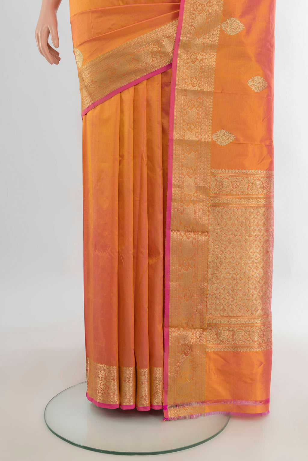 Pleats and pallu of Pure Silk Golden Peach Dual Tone Banarasi Katan Saree with Zari Butta on the body and Zari Border. 