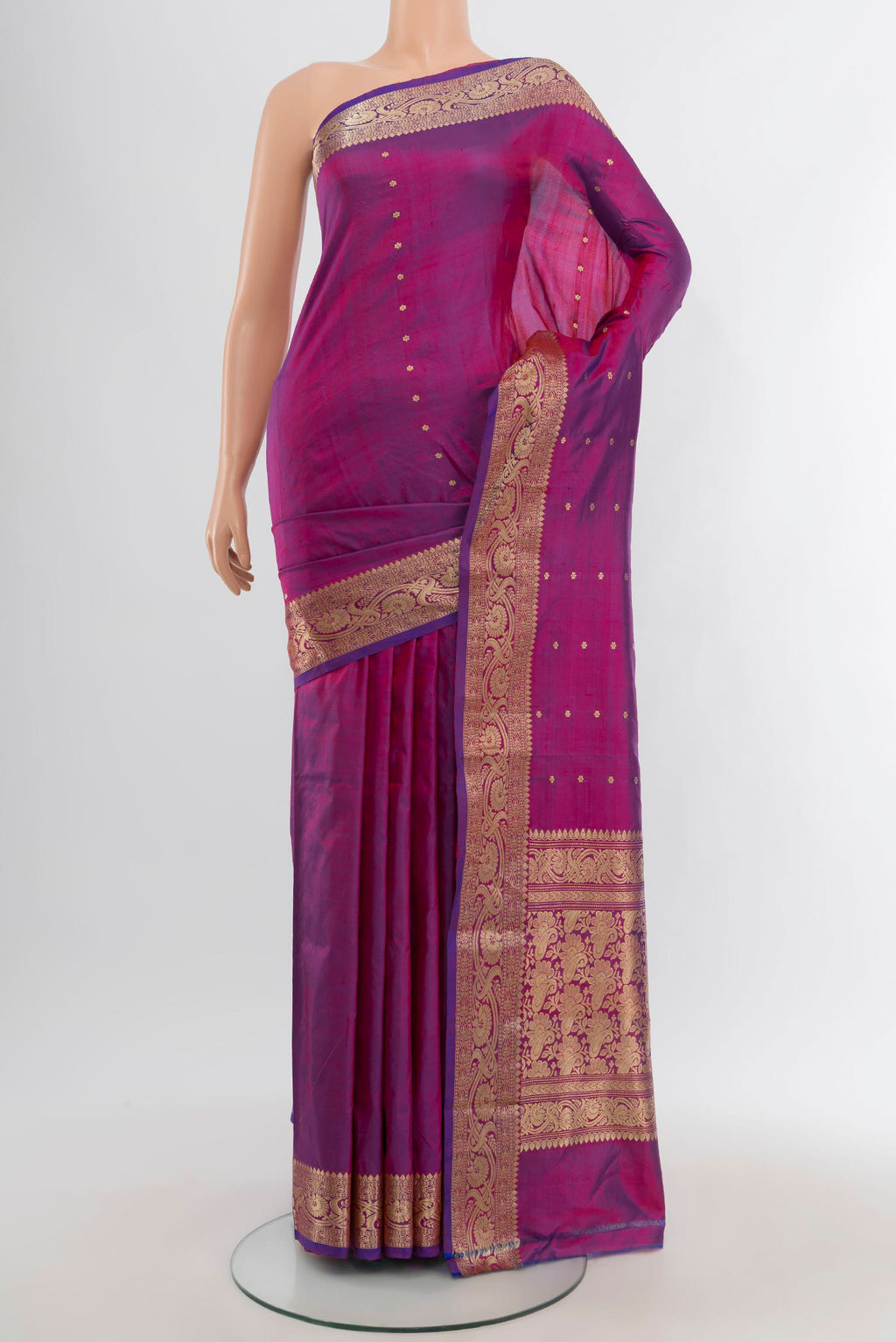 Purple Banarasi Katan Silk Saree with Zari Butta on the body and Zari Border.  displayed on a mannequin