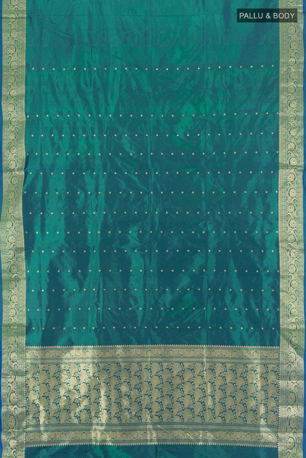 Flat view of Peacock Blue Banarasi Katan Silk Saree with Zari Butta on the body and Zari Border. 