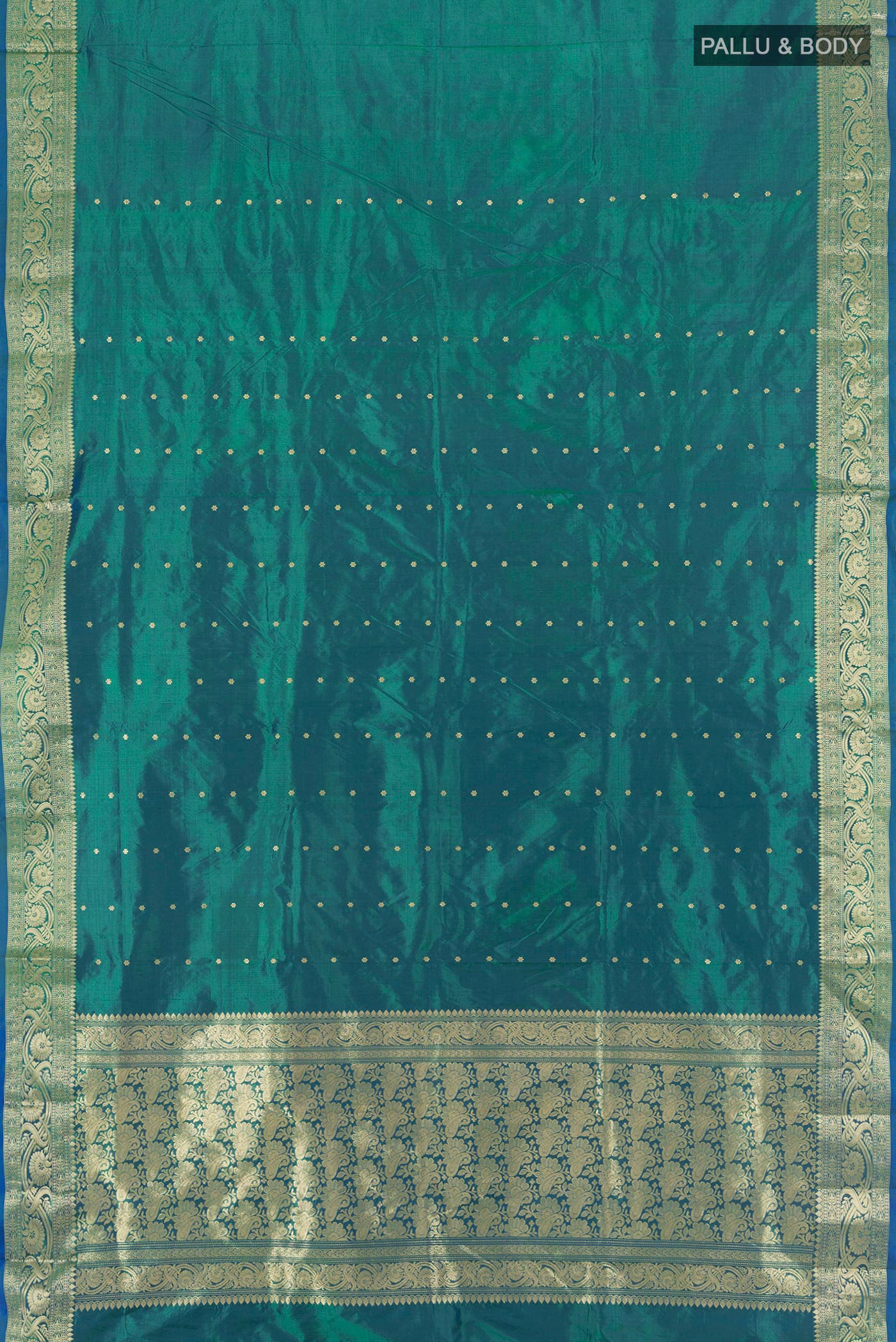 Flat view of Peacock Blue Banarasi Katan Silk Saree with Zari Butta on the body and Zari Border. 