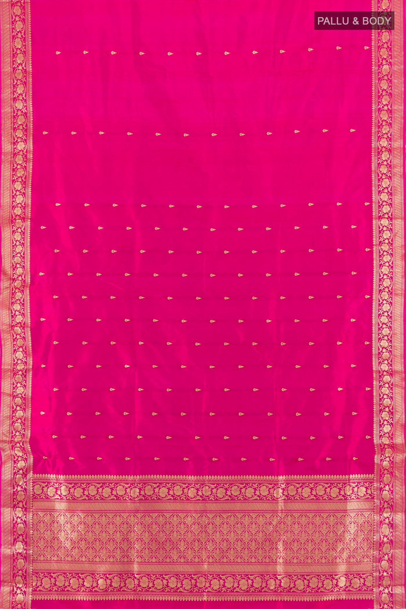 Flat view of Dark Pink Banarasi Katan Silk Saree with Thread Butta on the body and Zari Border. 