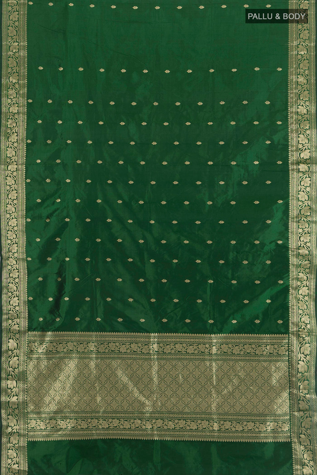 Flat view of Bottle Green Banarasi Katan Silk Saree with Zari Butta on the body and Zari Border. 