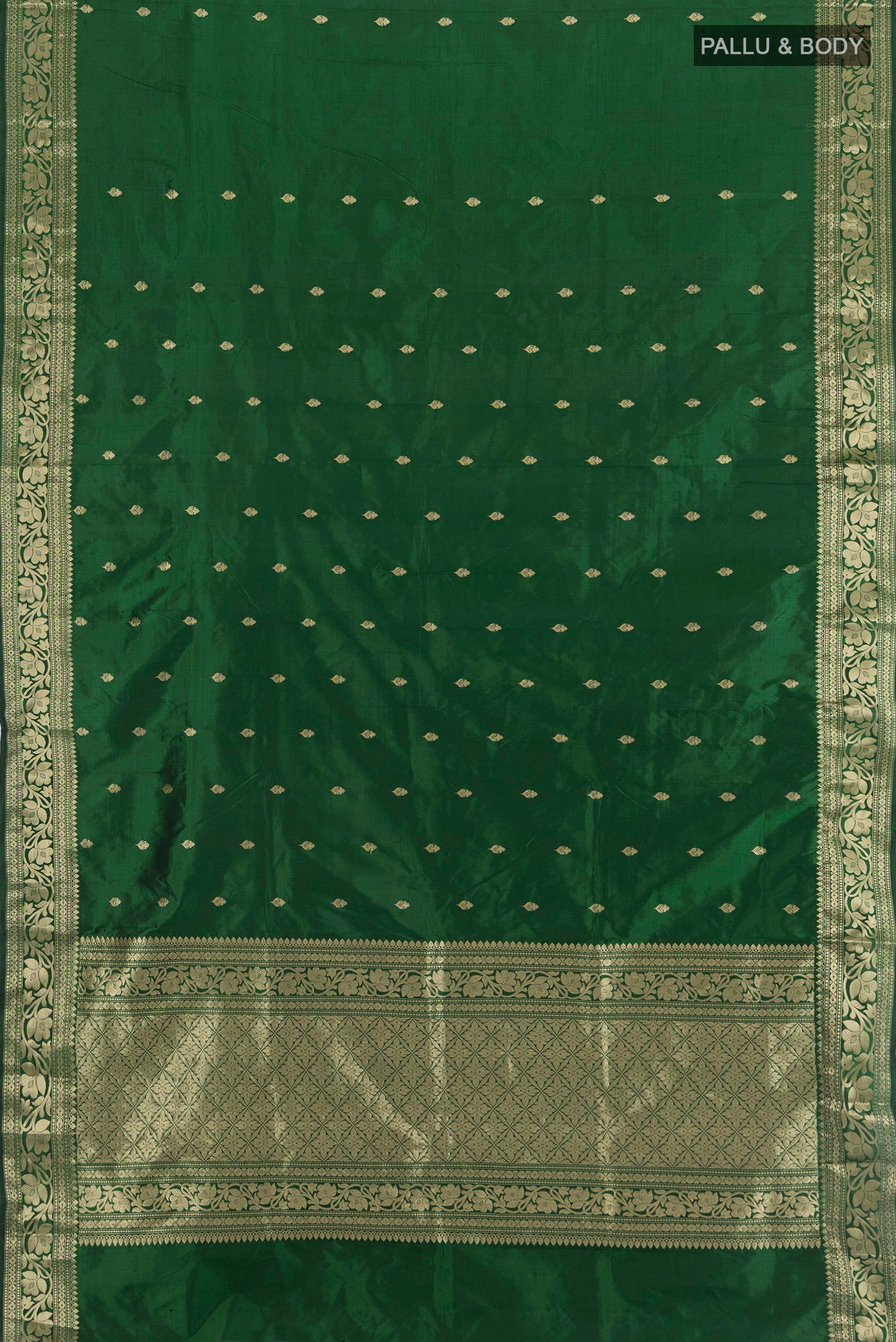 Flat view of Bottle Green Banarasi Katan Silk Saree with Zari Butta on the body and Zari Border. 