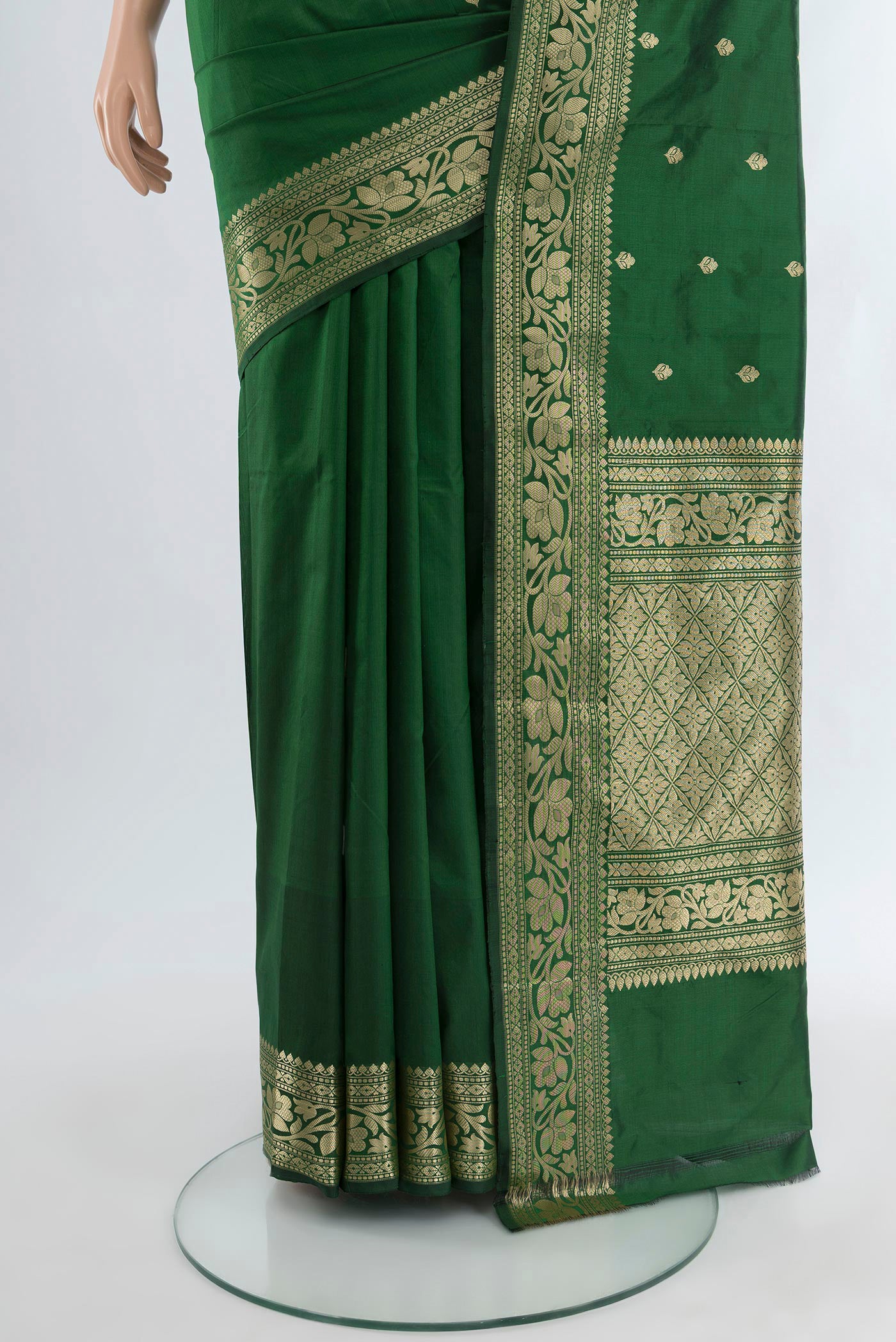 Pleats and pallu of Bottle Green Banarasi Katan Silk Saree with Zari Butta on the body and Zari Border. 