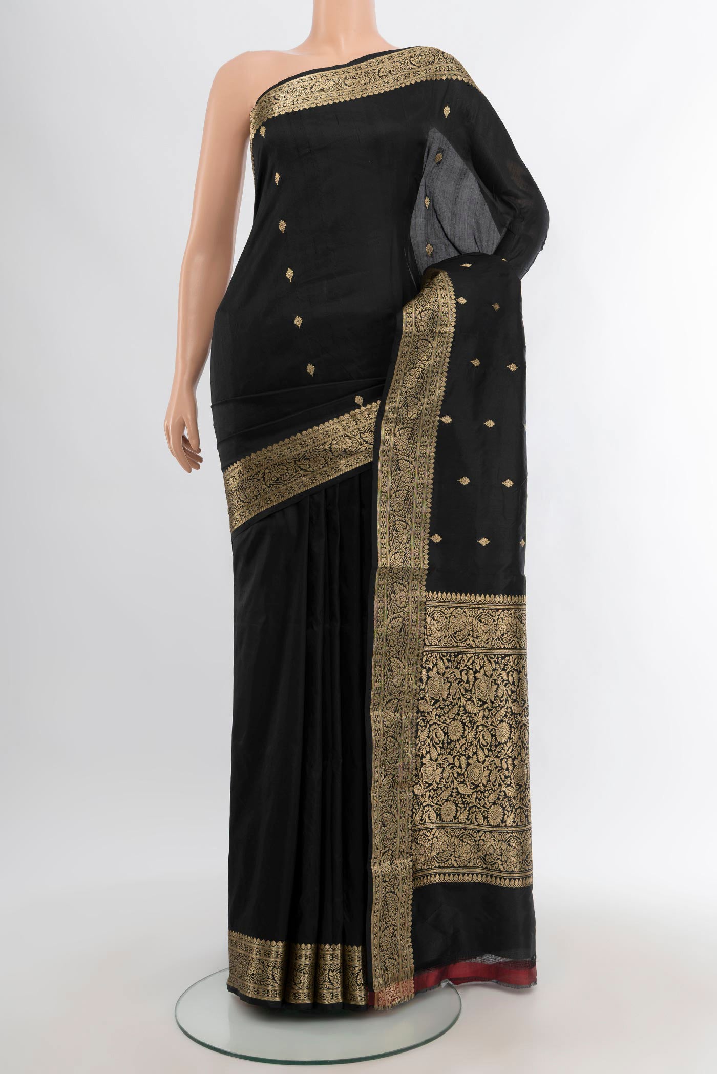 Black Banarasi Katan Silk Saree with Zari Butta on the body and Zari Border.  displayed on a mannequin