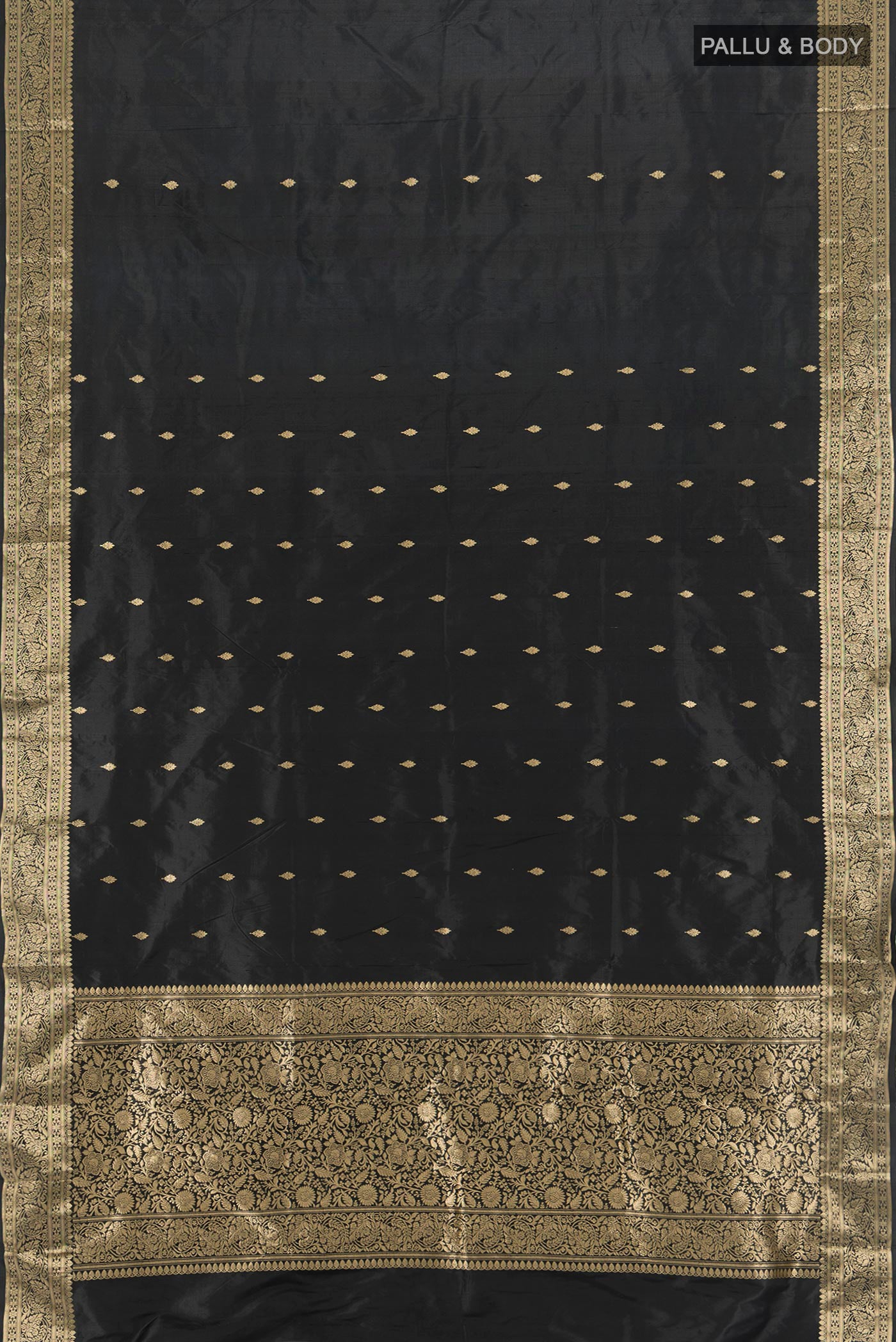 Flat view of Black Banarasi Katan Silk Saree with Zari Butta on the body and Zari Border. 