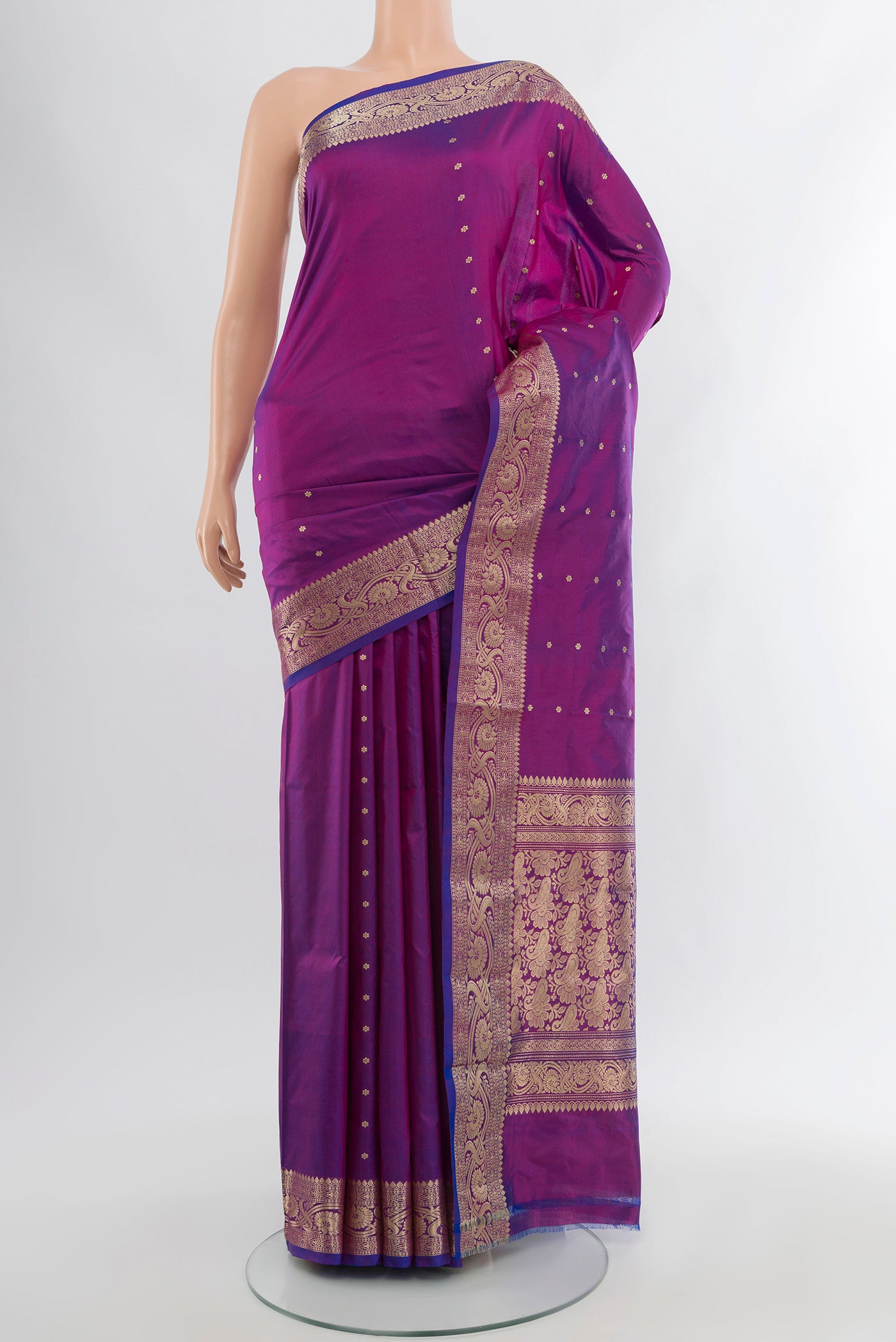 Purple Banarasi Katan Silk Saree with Zari Butta on the body and Silk Border.  displayed on a mannequin