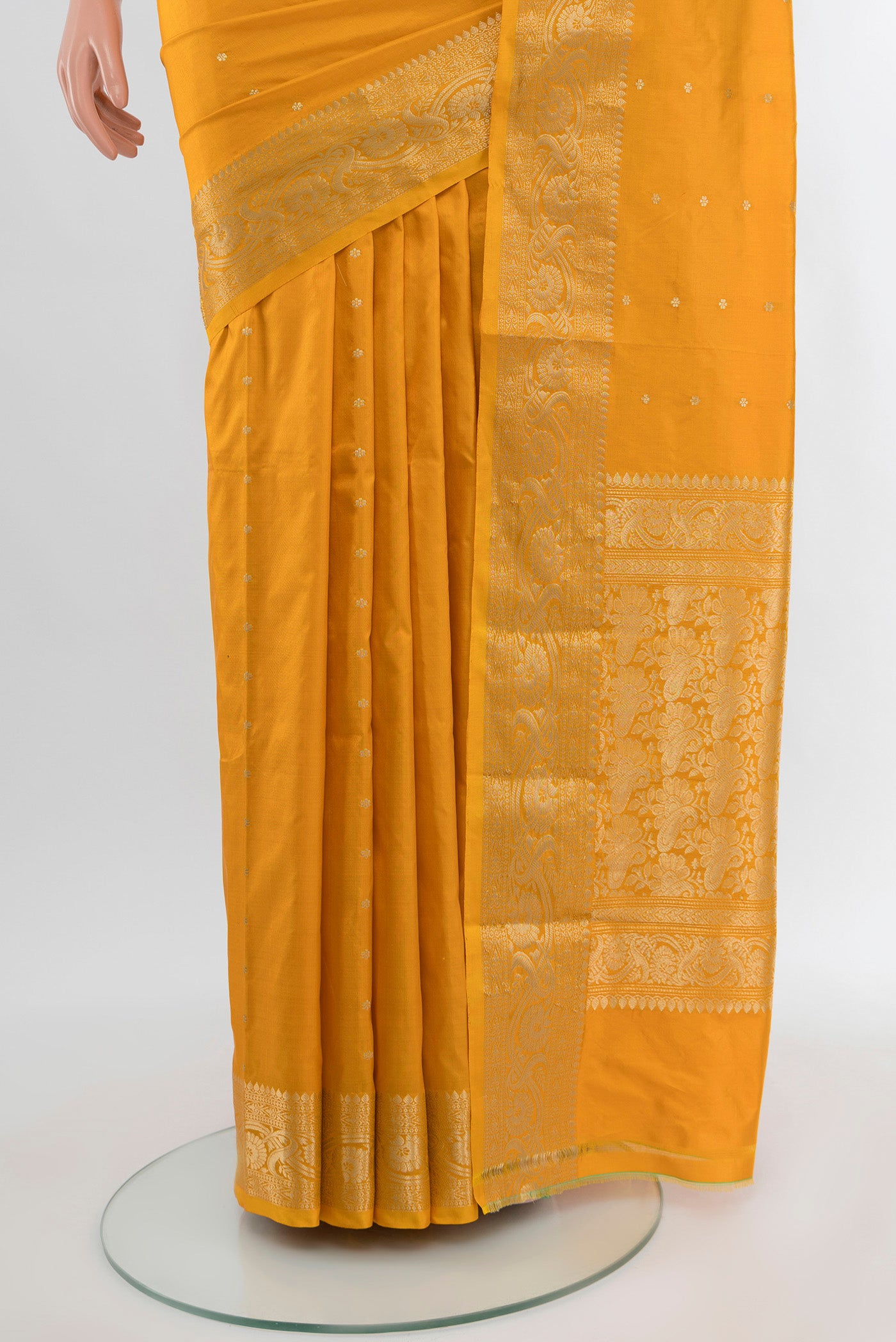Pleats and pallu of Yellow Banarasi Katan Silk Saree with Zari Butta on the body and Zari Border. 
